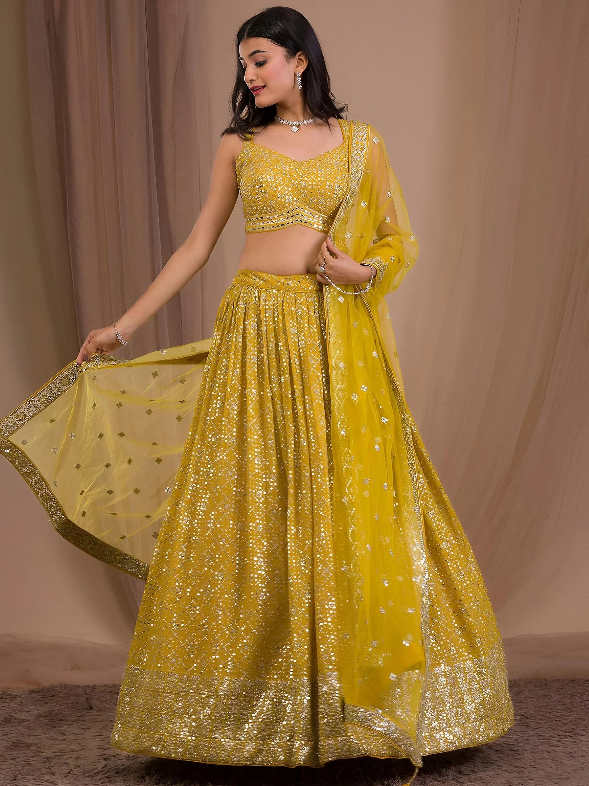 Alluring Yellow Sequins Georgette Haldi Wear Lehenga Choli