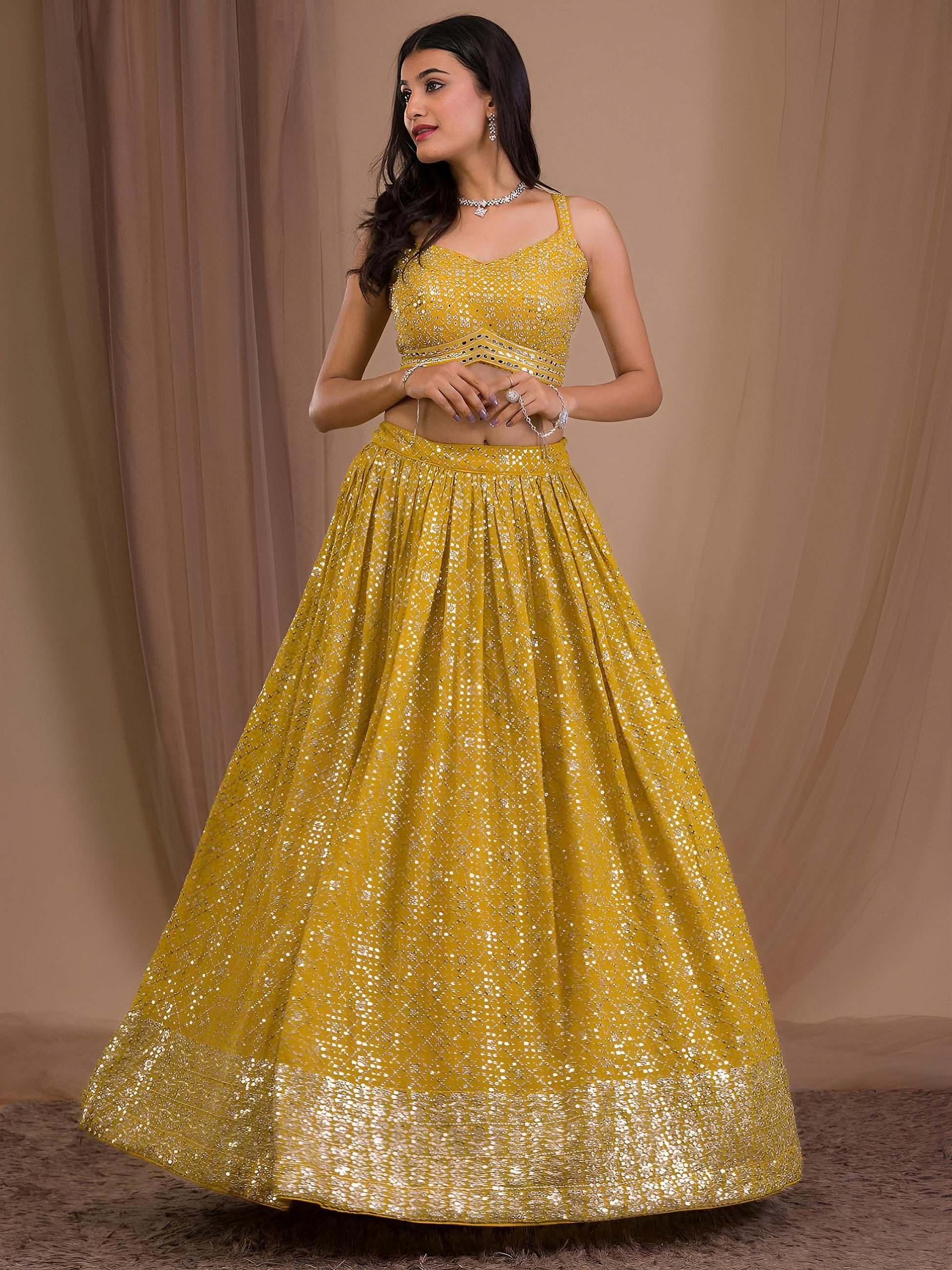Alluring Yellow Sequins Georgette Haldi Wear Lehenga Choli