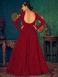 Elegant red long-sleeve gown with open back and embroidery, perfect for formal events and parties