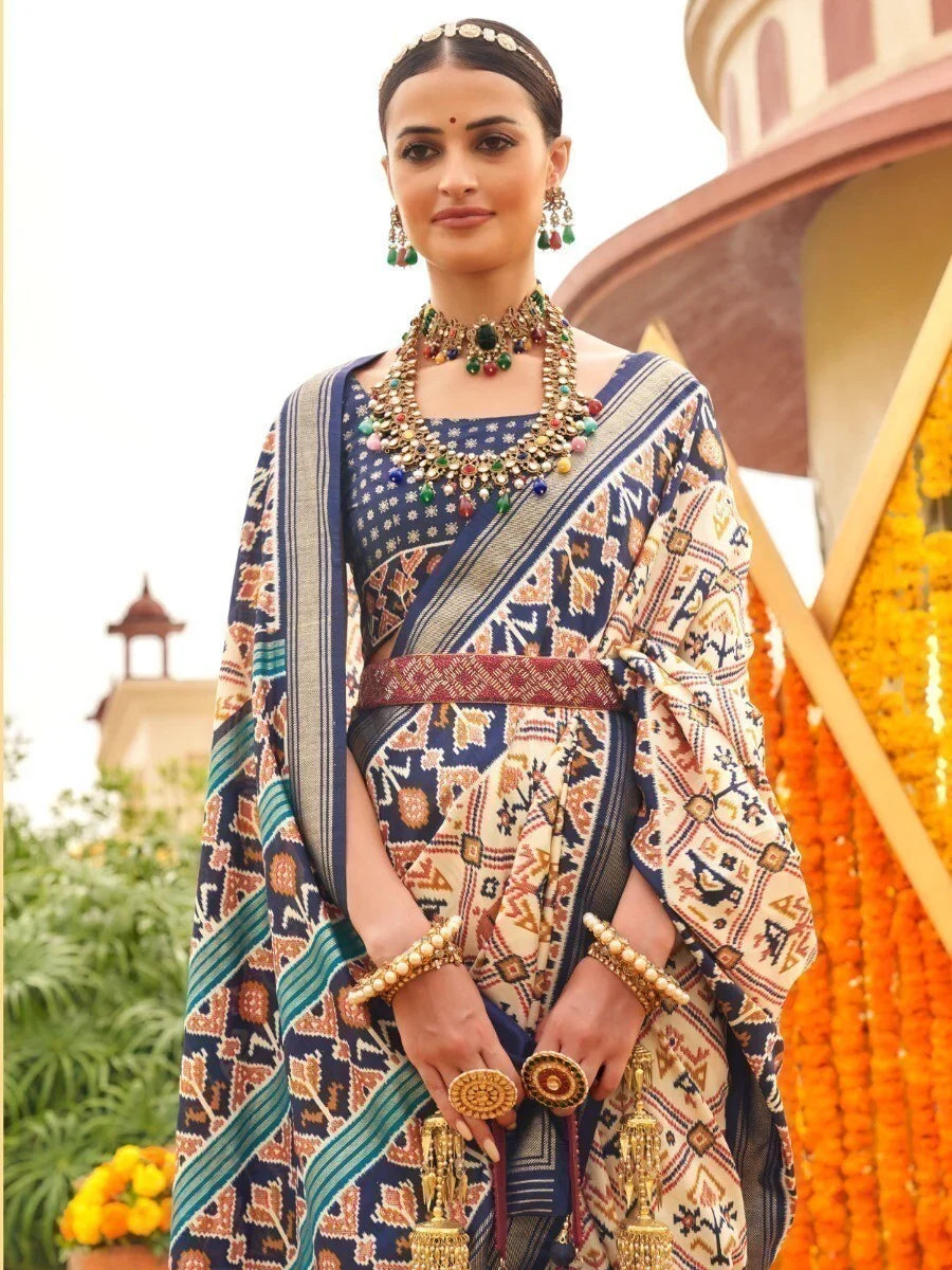 Amazing Cream & Blue Patola Printed Silk Traditional Saree