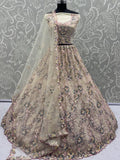 Appealing Yellow Floral Embroidered Net Wedding Wear Lehenga Choli With Dupatta - Zeel Clothing