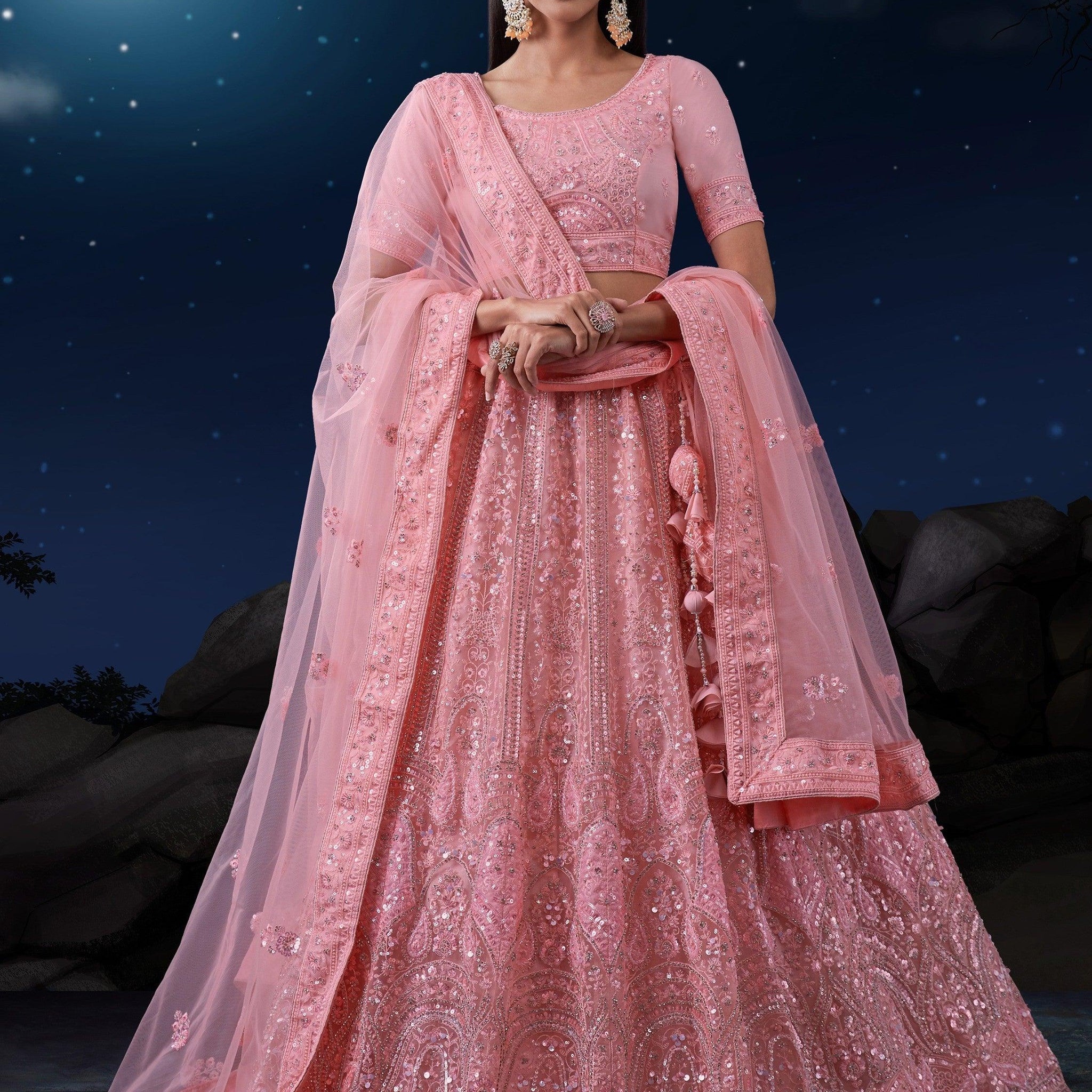 Enticing Pink Sequins Net Wedding Wear Lehenga Choli With Dupatta