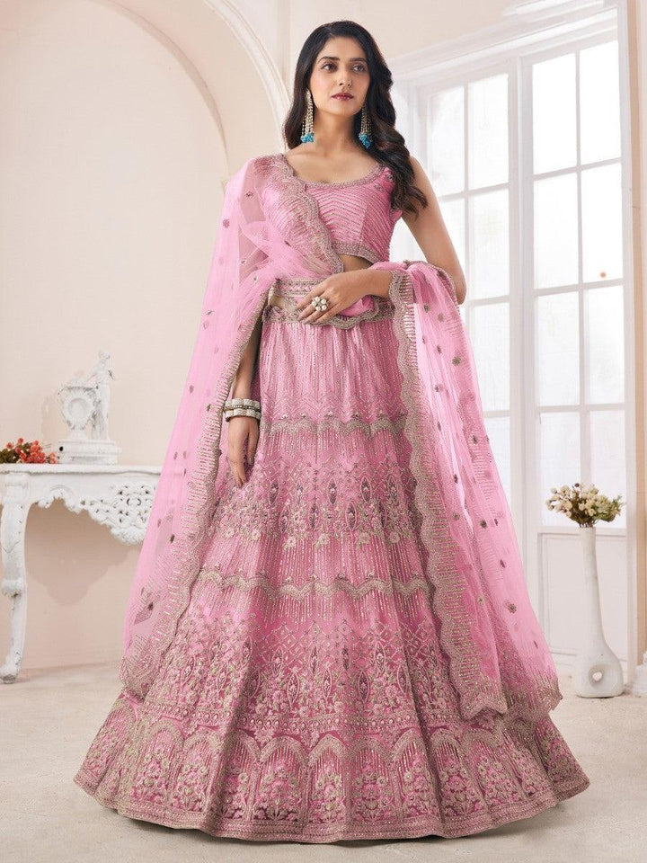 Enchanting Pink Sequins Net Wedding Wear Lehenga Choli With Dupatta