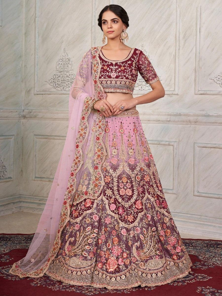 Fascinating Maroon Stone Work Net Wedding Lehenga Choli