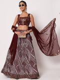 Maroon lehenga with geometric print, mirror work crop top, and sheer dupatta for women's ethnic fashion