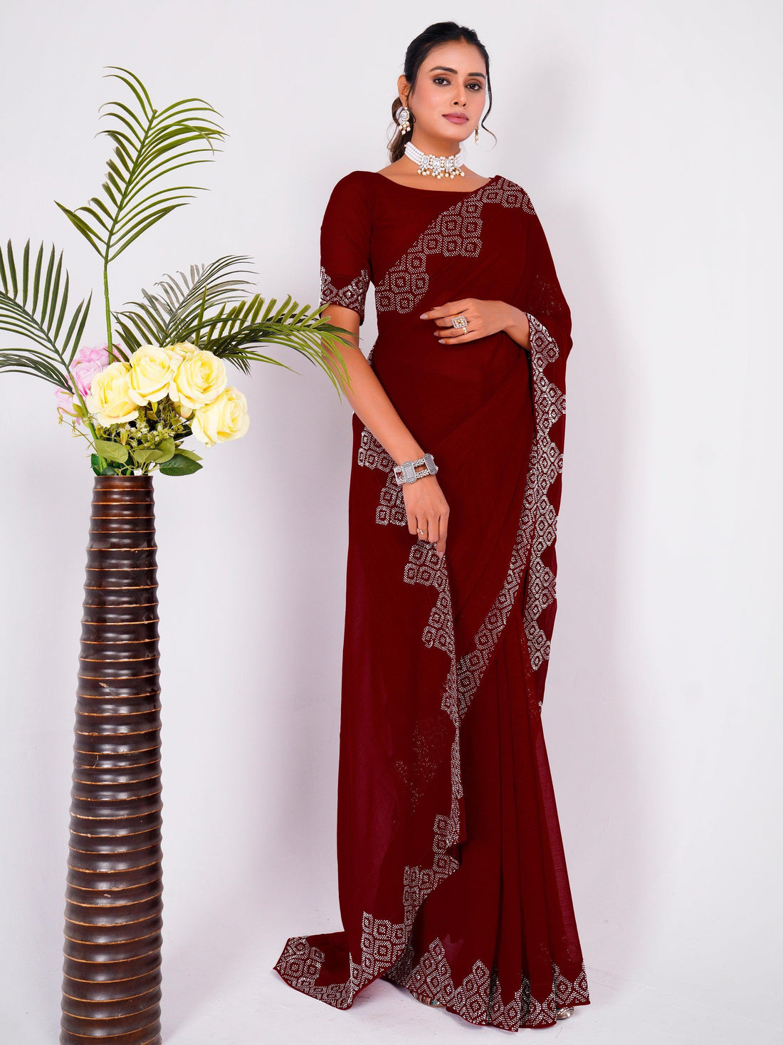 Astonishing Maroon Swarovski Work Georgette Saree With Blouse