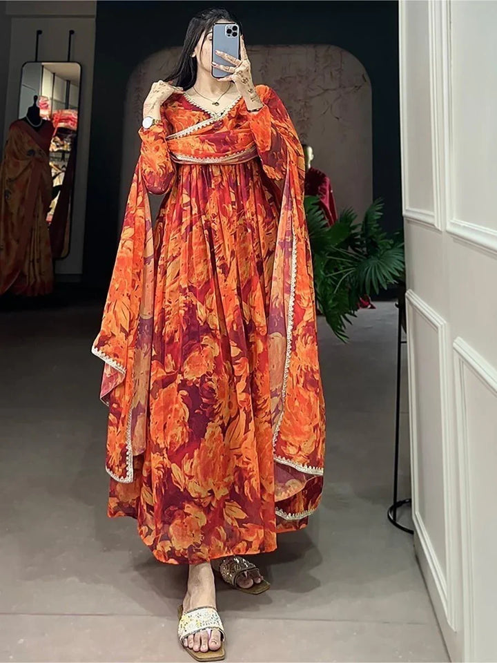 Astonishing Orange Floral Printed Georgette Festive Wear Gown