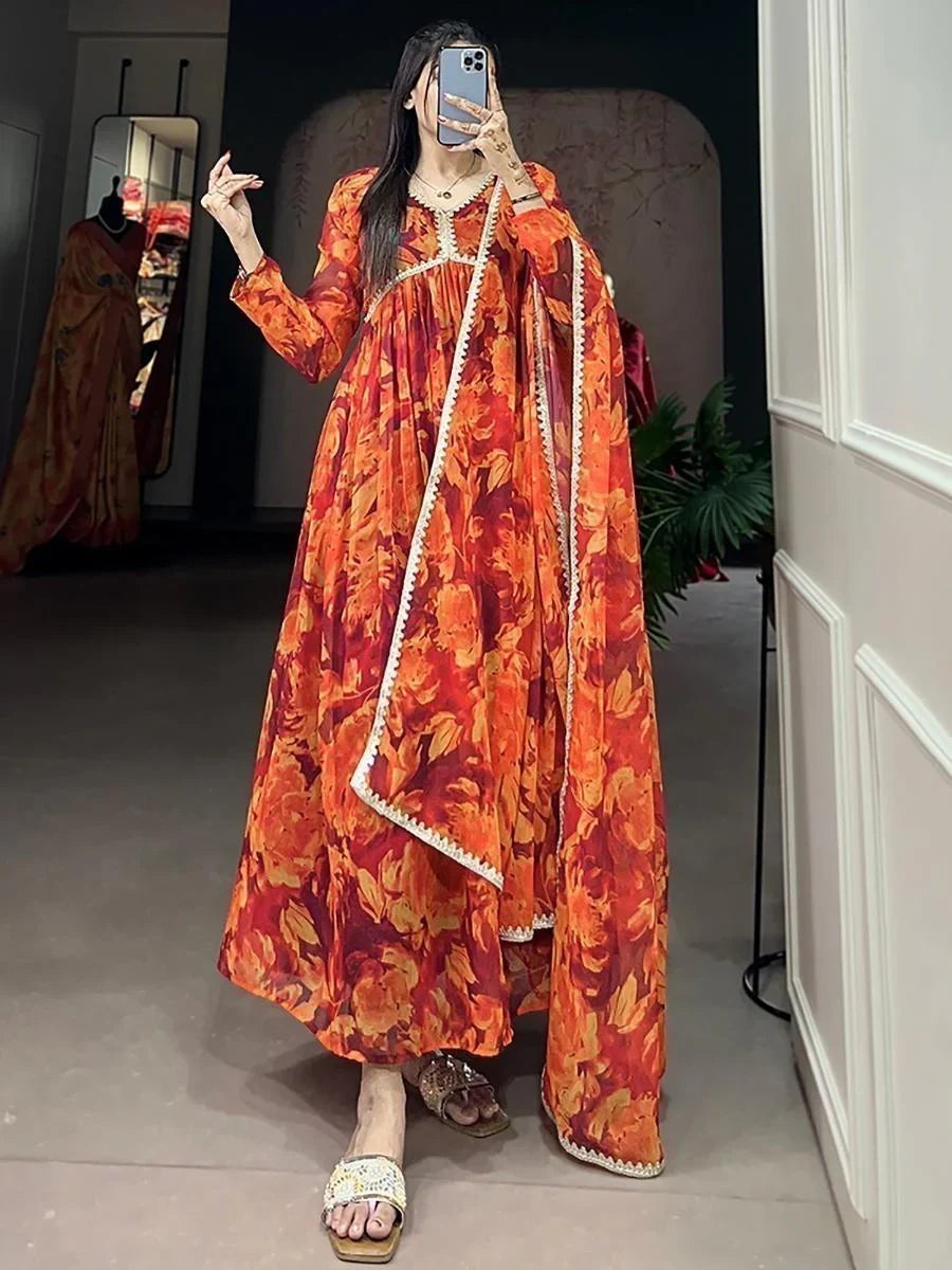 Astonishing Orange Floral Printed Georgette Festive Wear Gown