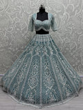 Astonishing Sky Blue Sequins Net Engagement Wear Lehenga Choli - Zeel Clothing