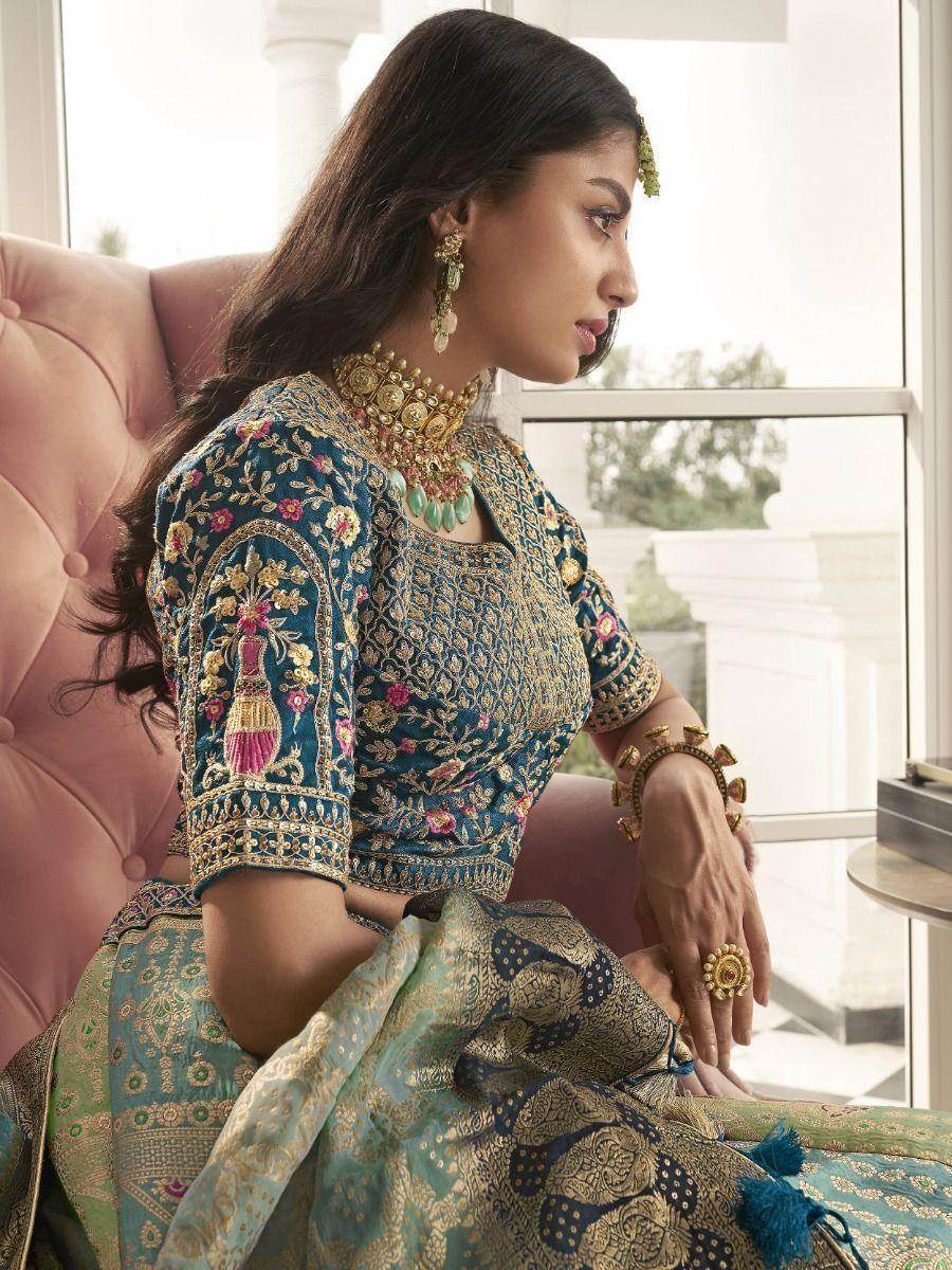 Astonishing Teal Embroidered Silk Bridal Wear Lehenga Choli - Zeel Clothing