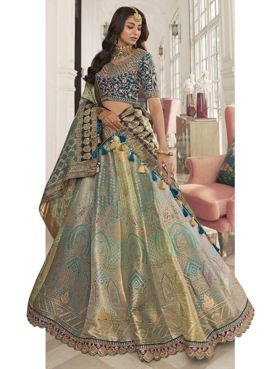Astonishing Teal Embroidered Silk Bridal Wear Lehenga Choli - Zeel Clothing