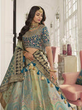 Astonishing Teal Embroidered Silk Bridal Wear Lehenga Choli - Zeel Clothing