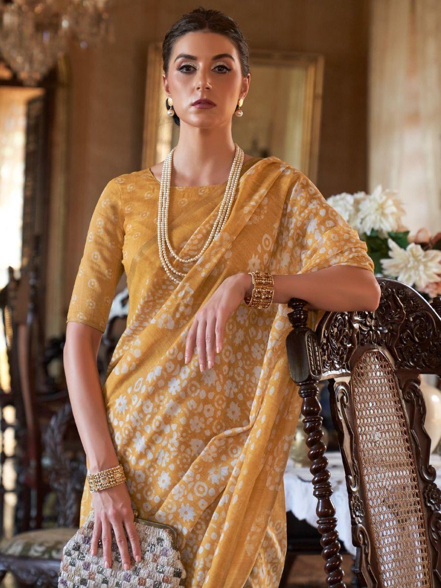 Astonishing Yellow Floral Printed Cotton Contemporary Wear Saree