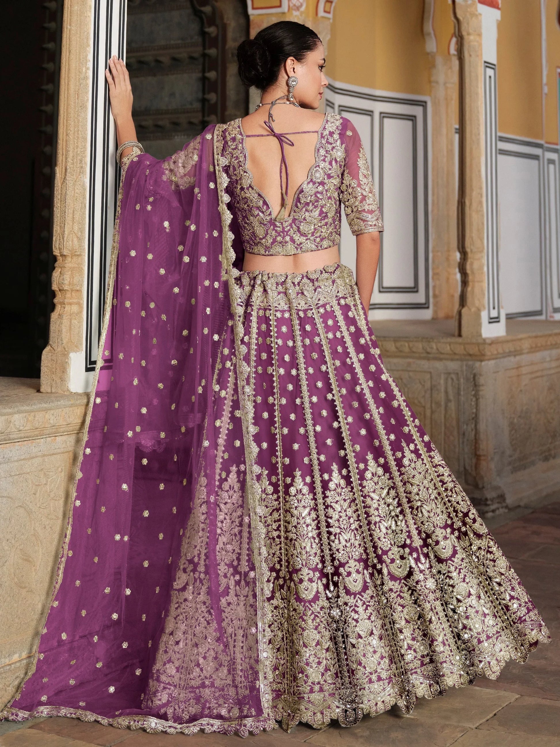 Astounding Purple Zari Embroidery Net Reception Wear Lehenga With Blouse