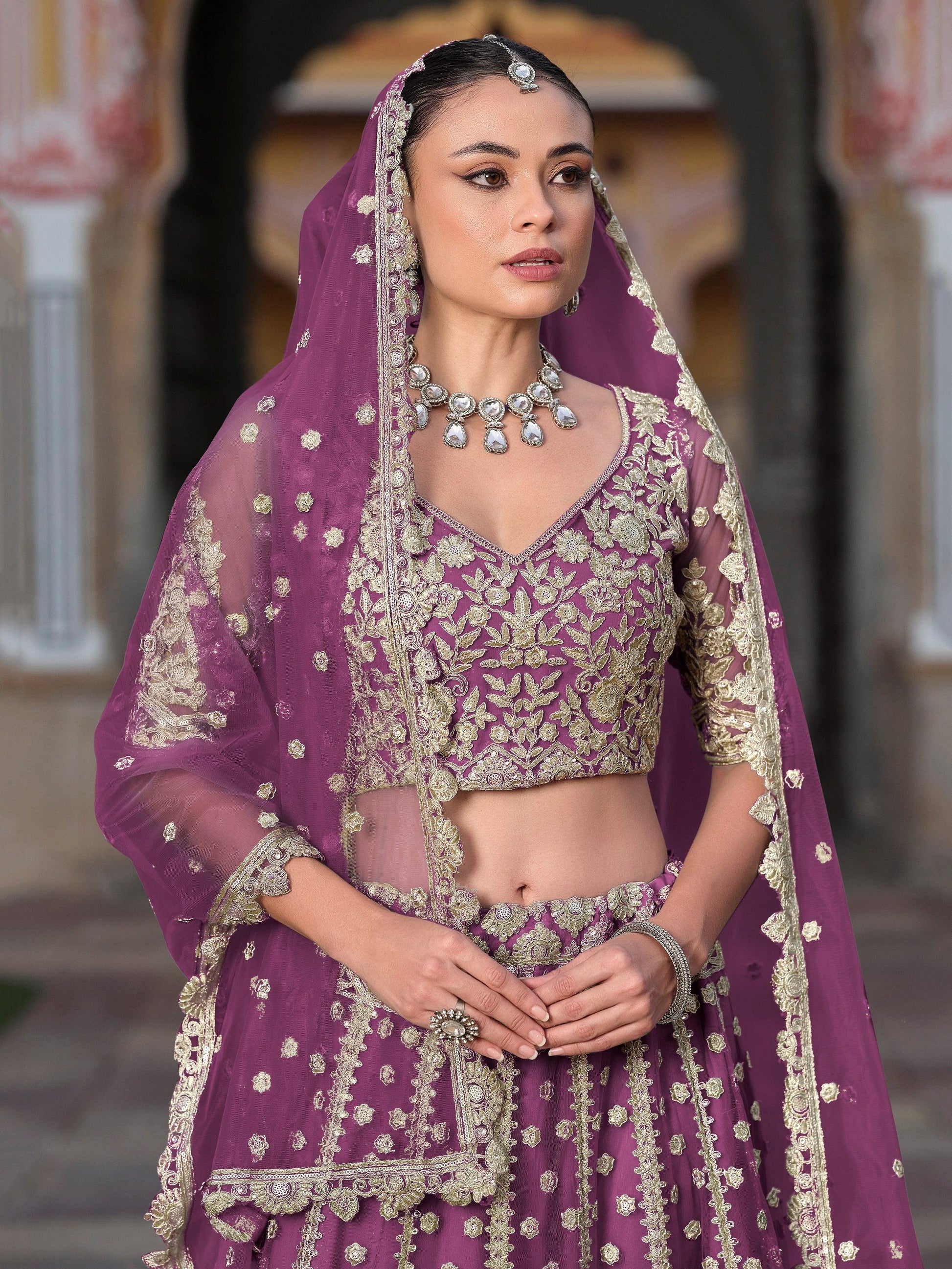 Astounding Purple Zari Embroidery Net Reception Wear Lehenga With Blouse