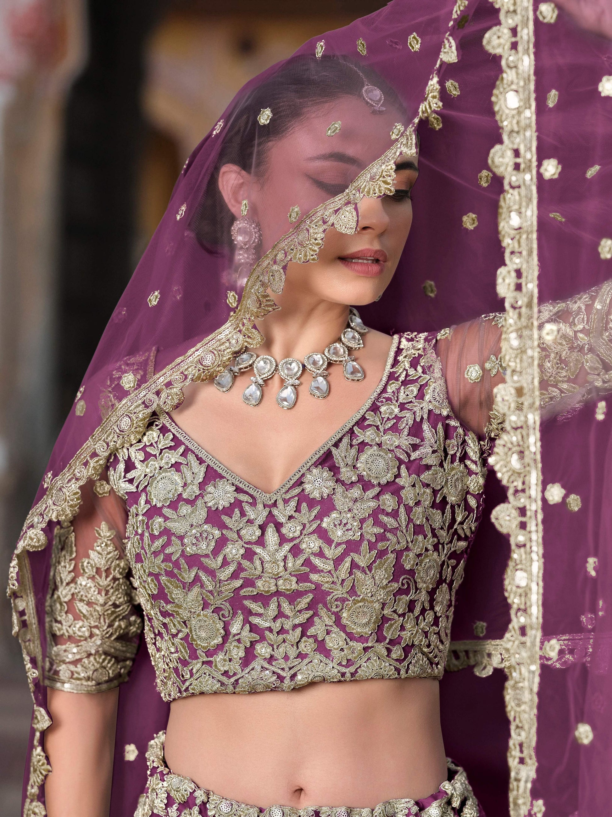 Astounding Purple Zari Embroidery Net Reception Wear Lehenga With Blouse
