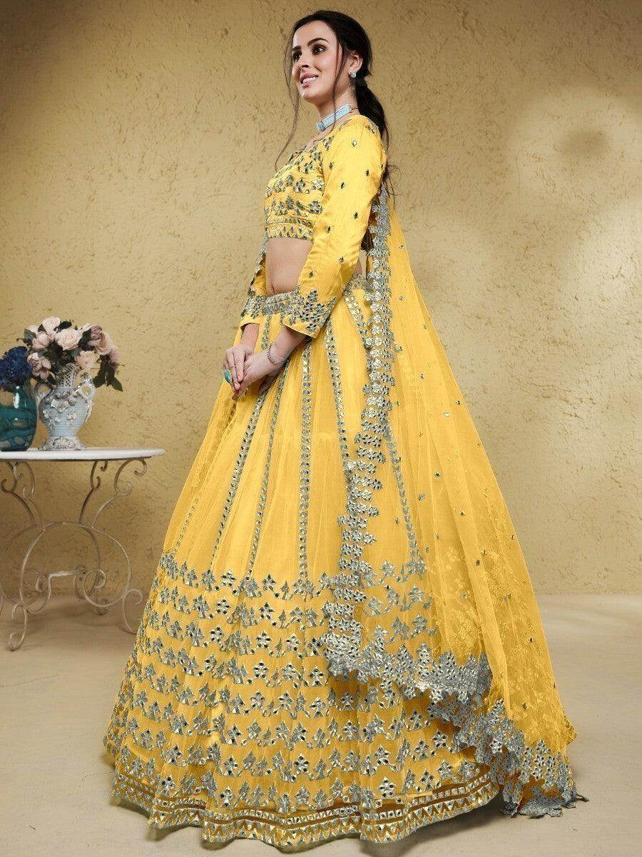 Astounding Yellow Foil Work Net Function Wear Lehenga Choli - Zeel Clothing