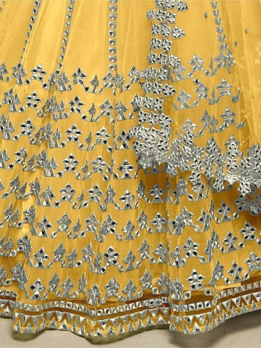 Astounding Yellow Foil Work Net Function Wear Lehenga Choli - Zeel Clothing