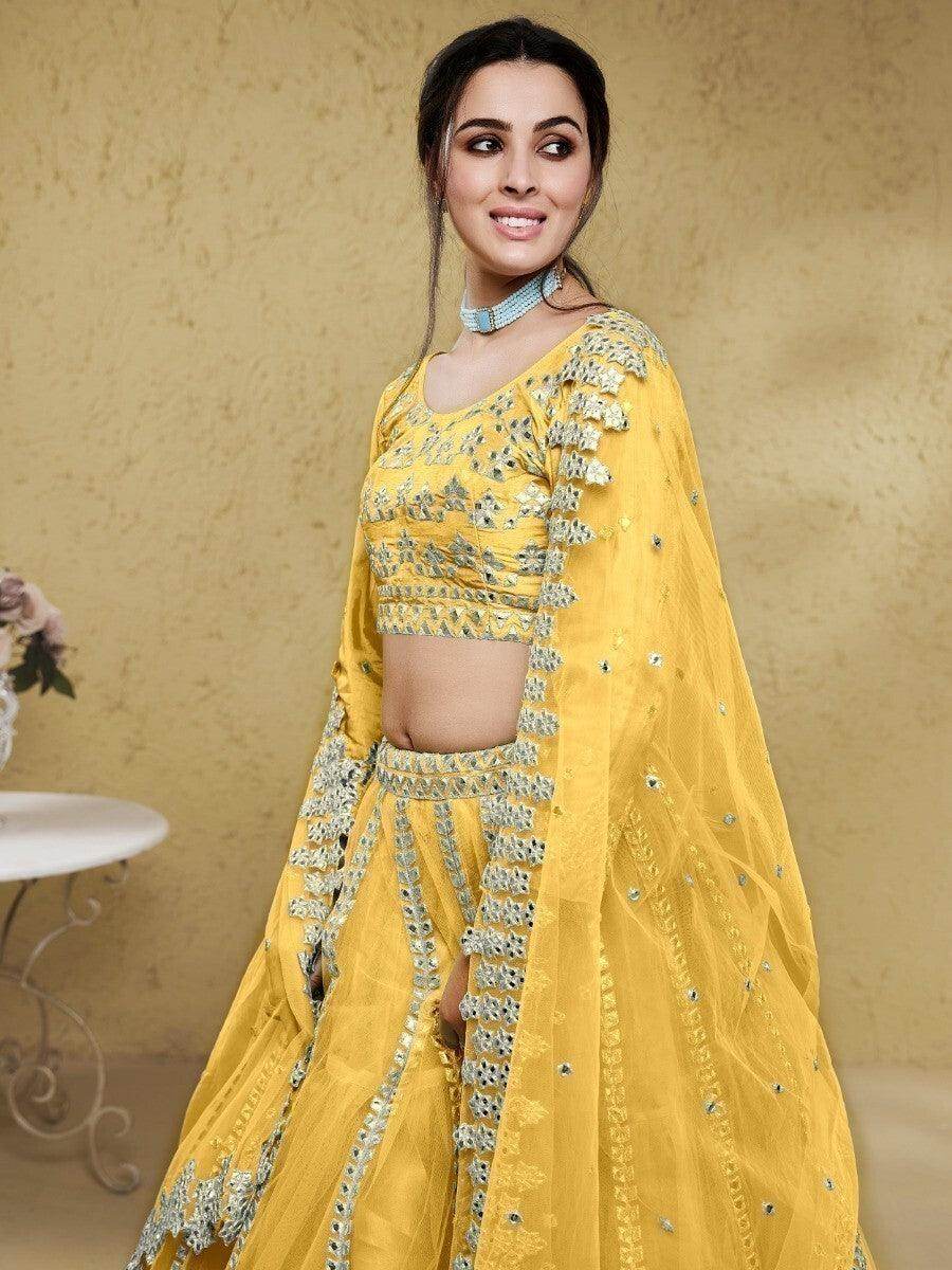 Astounding Yellow Foil Work Net Function Wear Lehenga Choli - Zeel Clothing