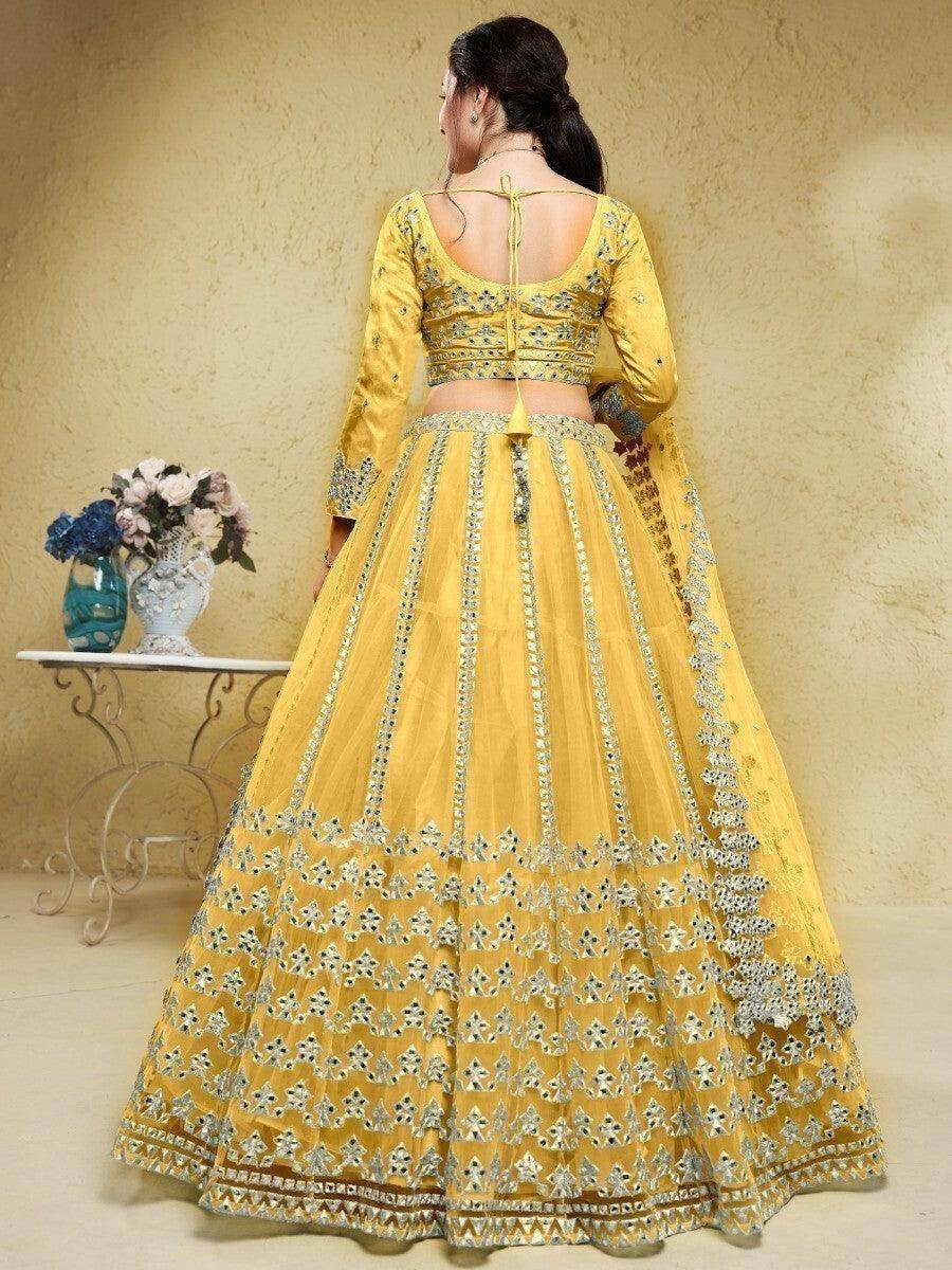 Astounding Yellow Foil Work Net Function Wear Lehenga Choli - Zeel Clothing