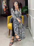 Attractive Black-White Animal Printed Chiffon Nayra Cut Traditional Kurti - Zeel Clothing