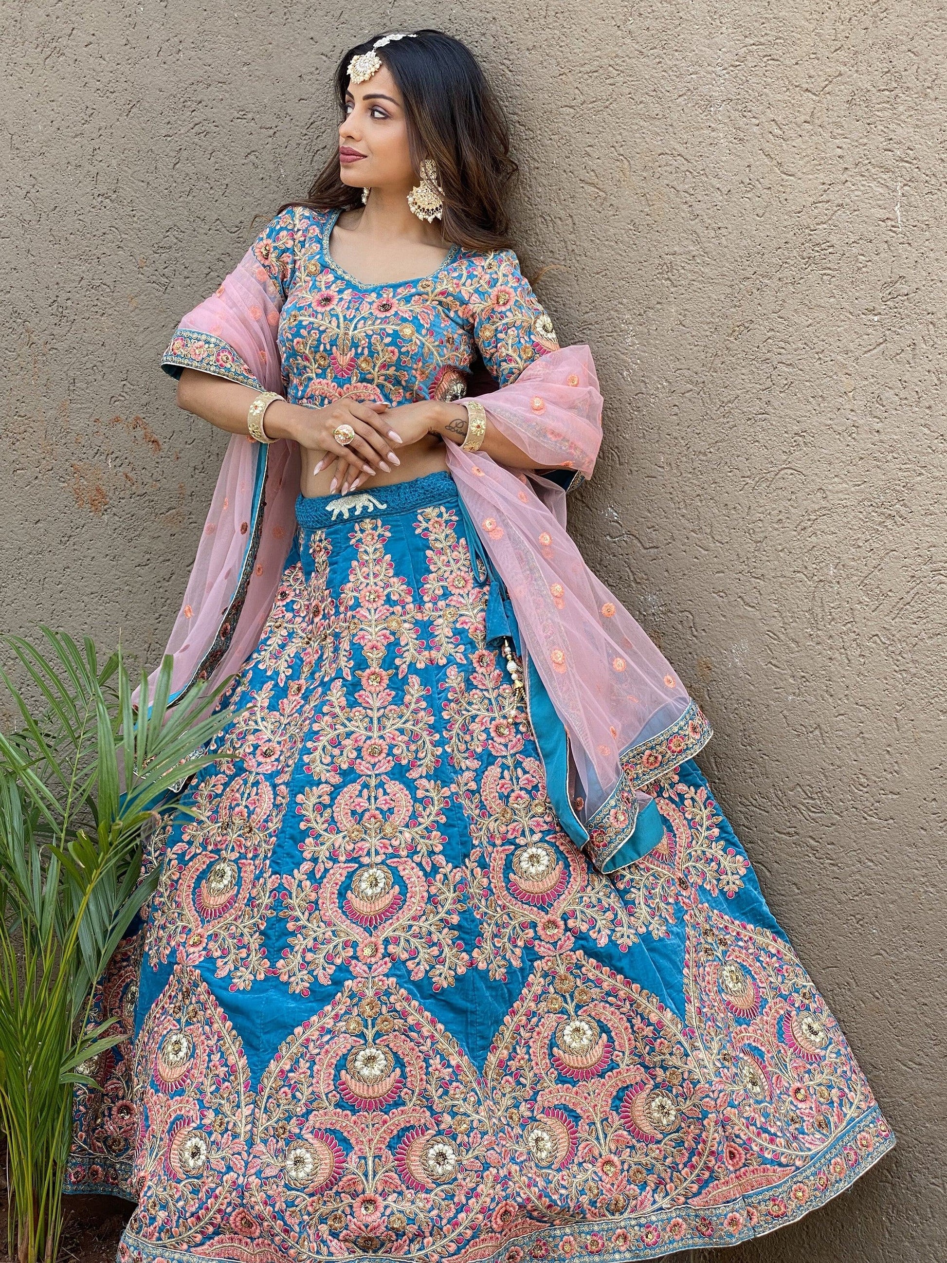 Attractive Blue Embroidered Velvet Wedding Wear Lehenga Choli - Zeel Clothing