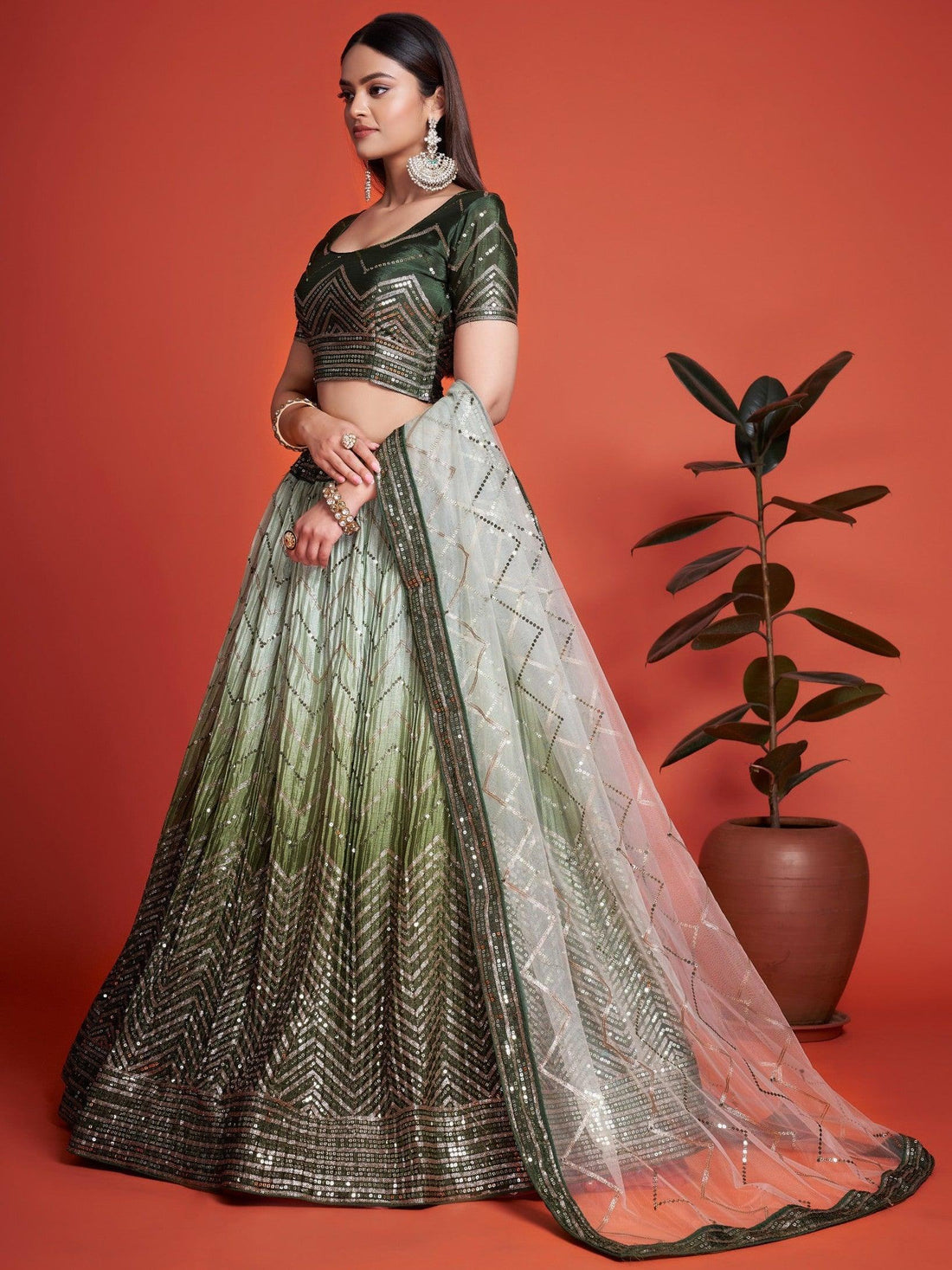 Attractive Green Sequins Chinon Mehendi Wear Lehenga Choli