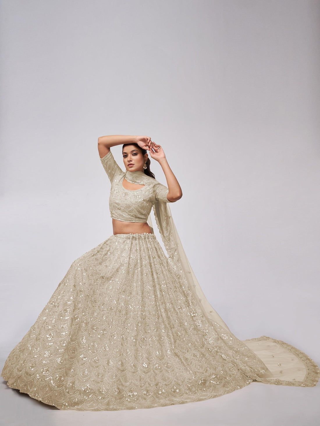 Attractive Ivory Sequins Net Designer Lehenga Choli With Dupatta