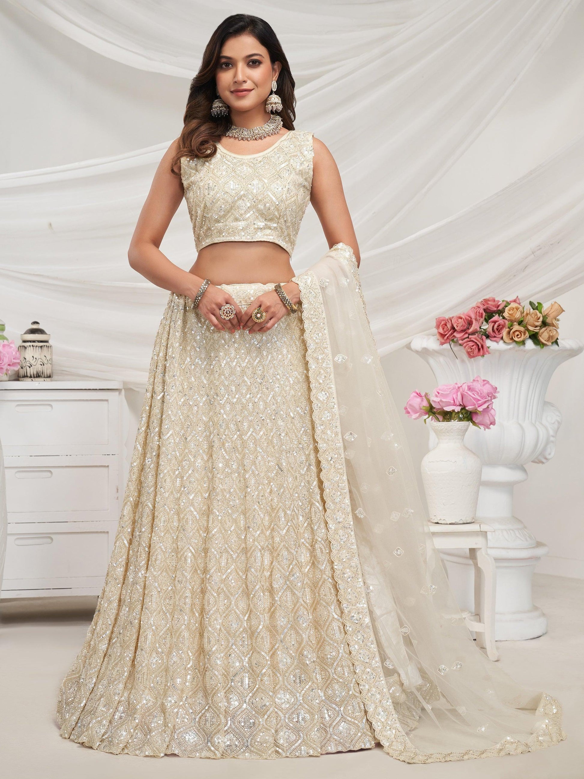 Attractive Ivory Sequins Net Reception Wear Lehenga Choli With Dupatta