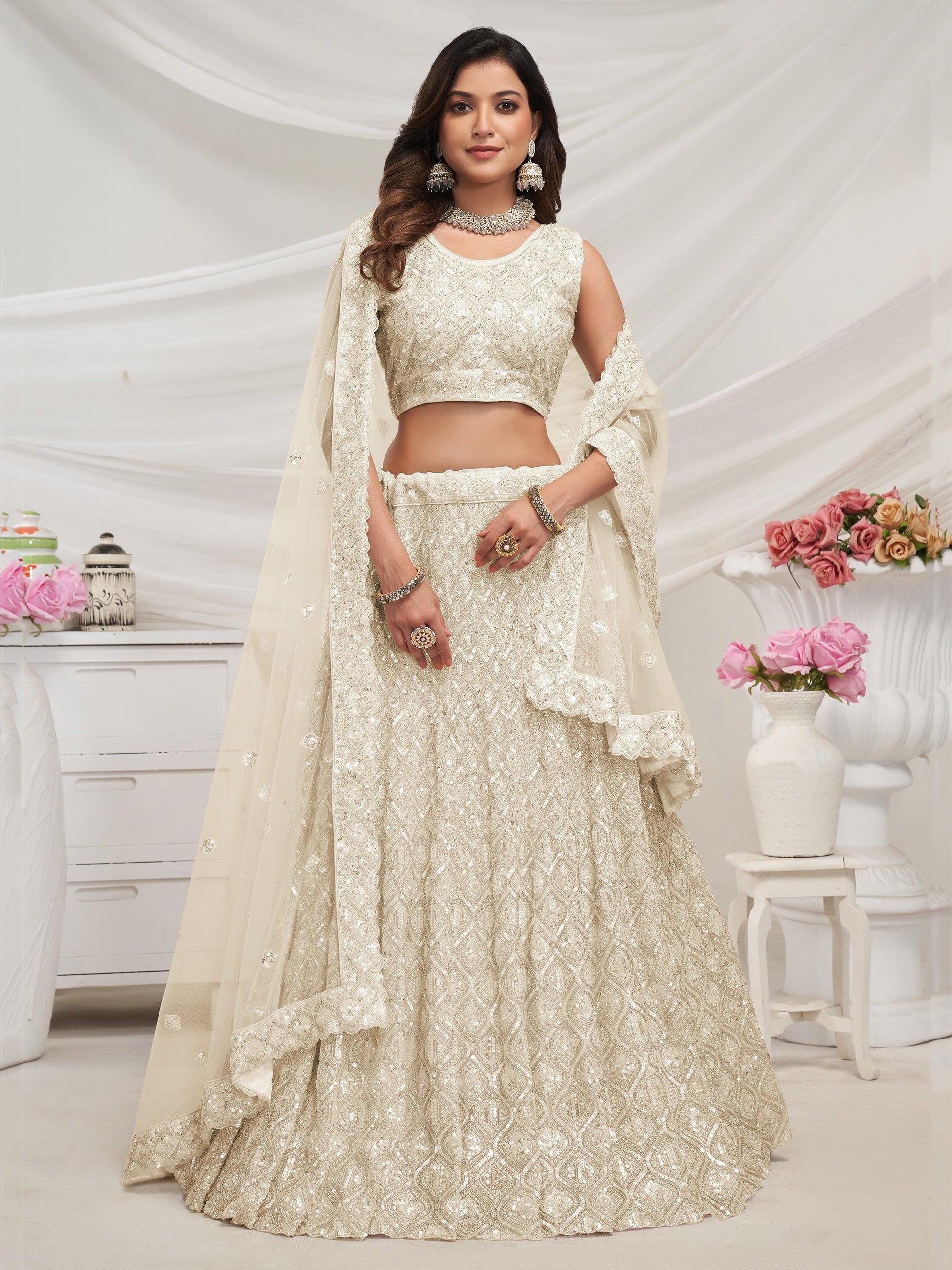 Attractive Ivory Sequins Net Reception Wear Lehenga Choli With Dupatta