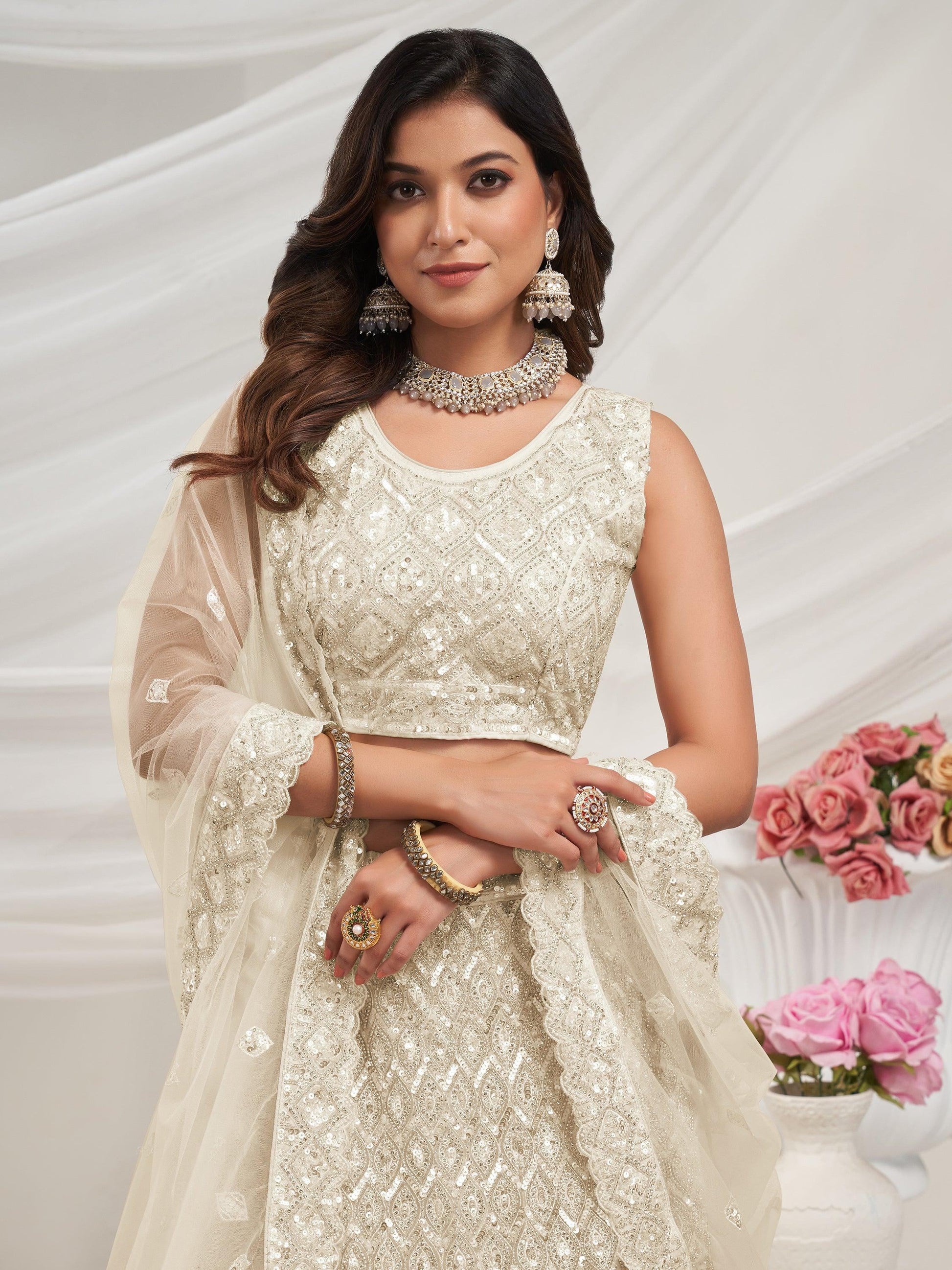 Attractive Ivory Sequins Net Reception Wear Lehenga Choli With Dupatta