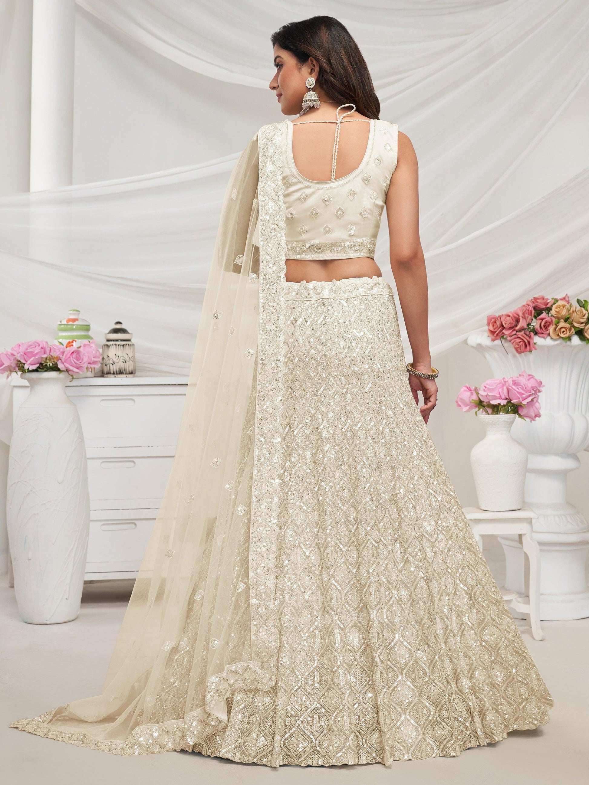 Attractive Ivory Sequins Net Reception Wear Lehenga Choli With Dupatta