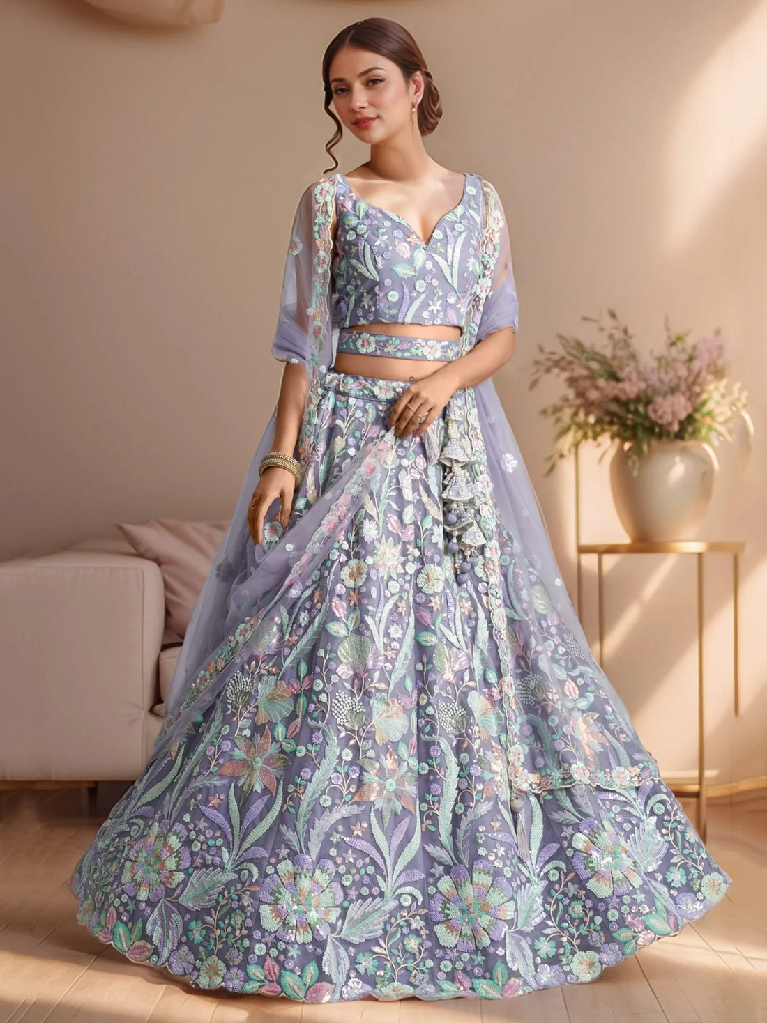 Attractive Lavender Floral Embroidered Net Party Wear Lehenga Choli