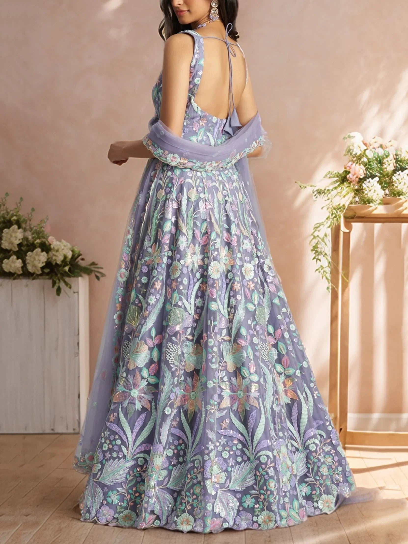 Attractive Lavender Floral Embroidered Net Party Wear Lehenga Choli