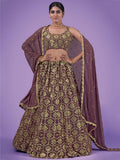 Elegant maroon and gold lehenga with intricate embroidery, perfect for festive occasions and weddings.