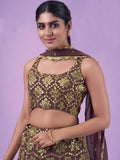 Women's maroon and gold embroidered crop top with matching skirt and dupatta, elegant ethnic wear