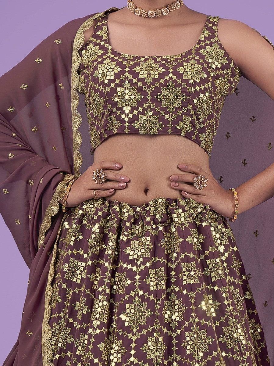Purple and gold embroidered lehenga set with matching dupatta, perfect for festive occasions and traditional events.