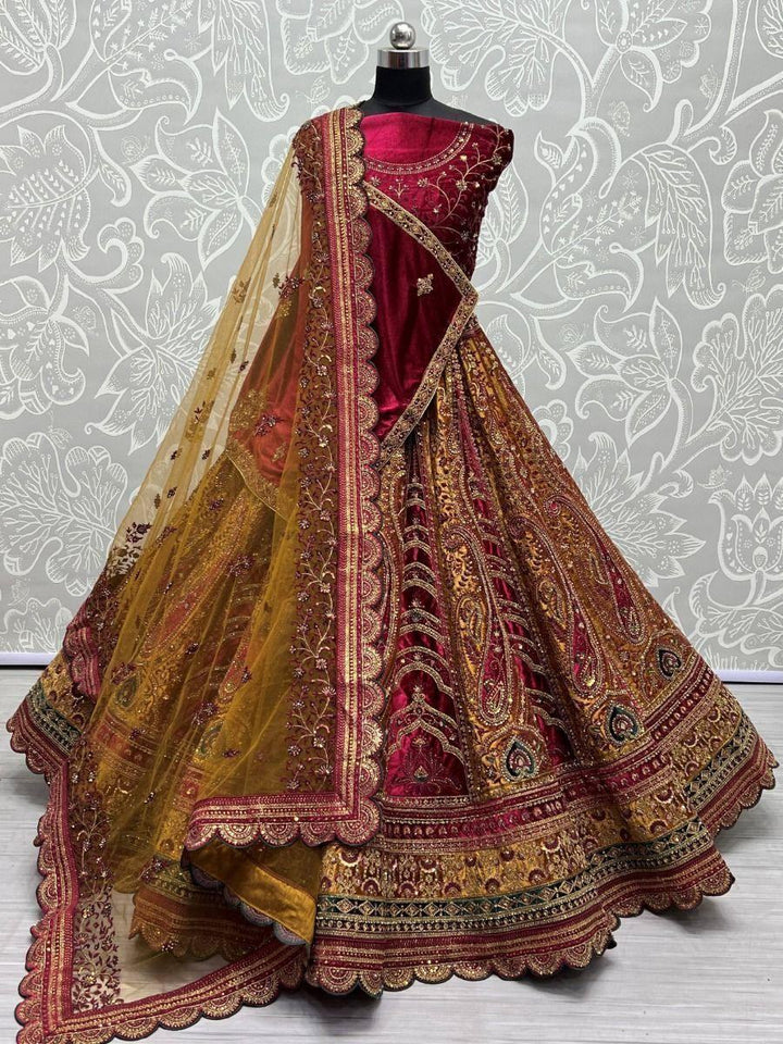 Attractive Mustard Embroidered Velvet Bridal Wear Lehenga Choli