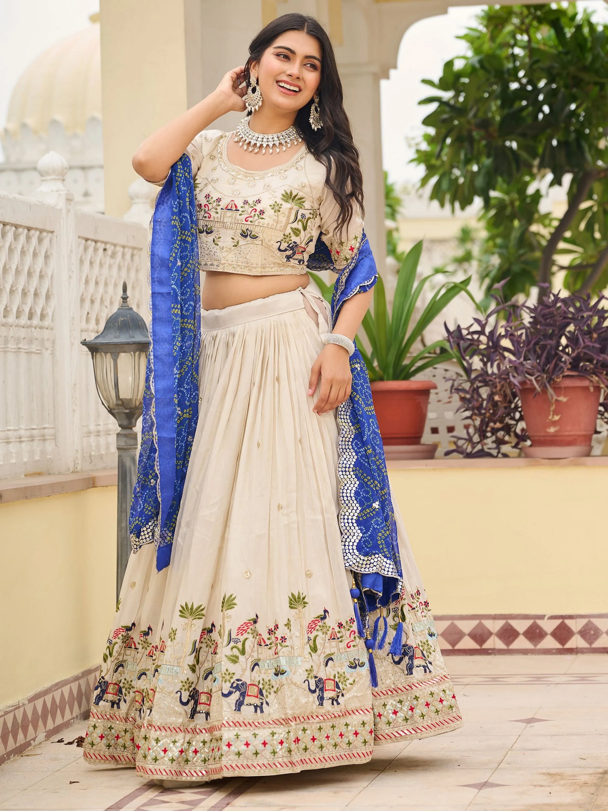 Attractive Off-White Thread Work Tissue Event Wear Lehenga Choli With Blue Dupatta