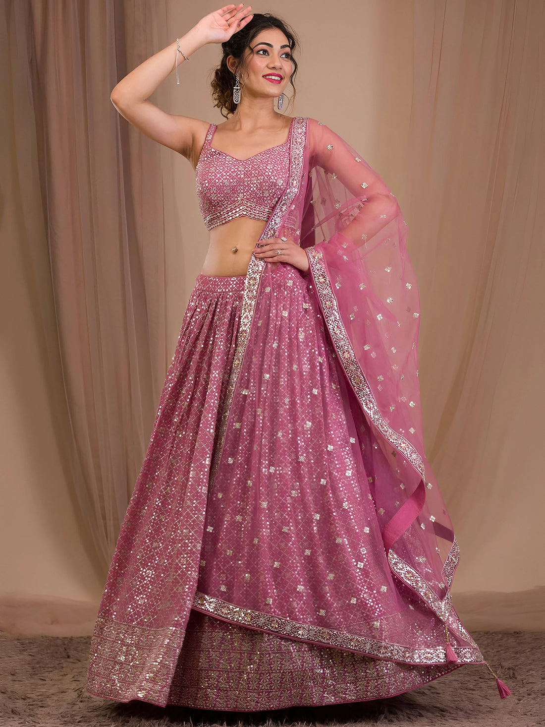 Attractive Pink Sequins Georgette Engagement Wear Lehenga Choli