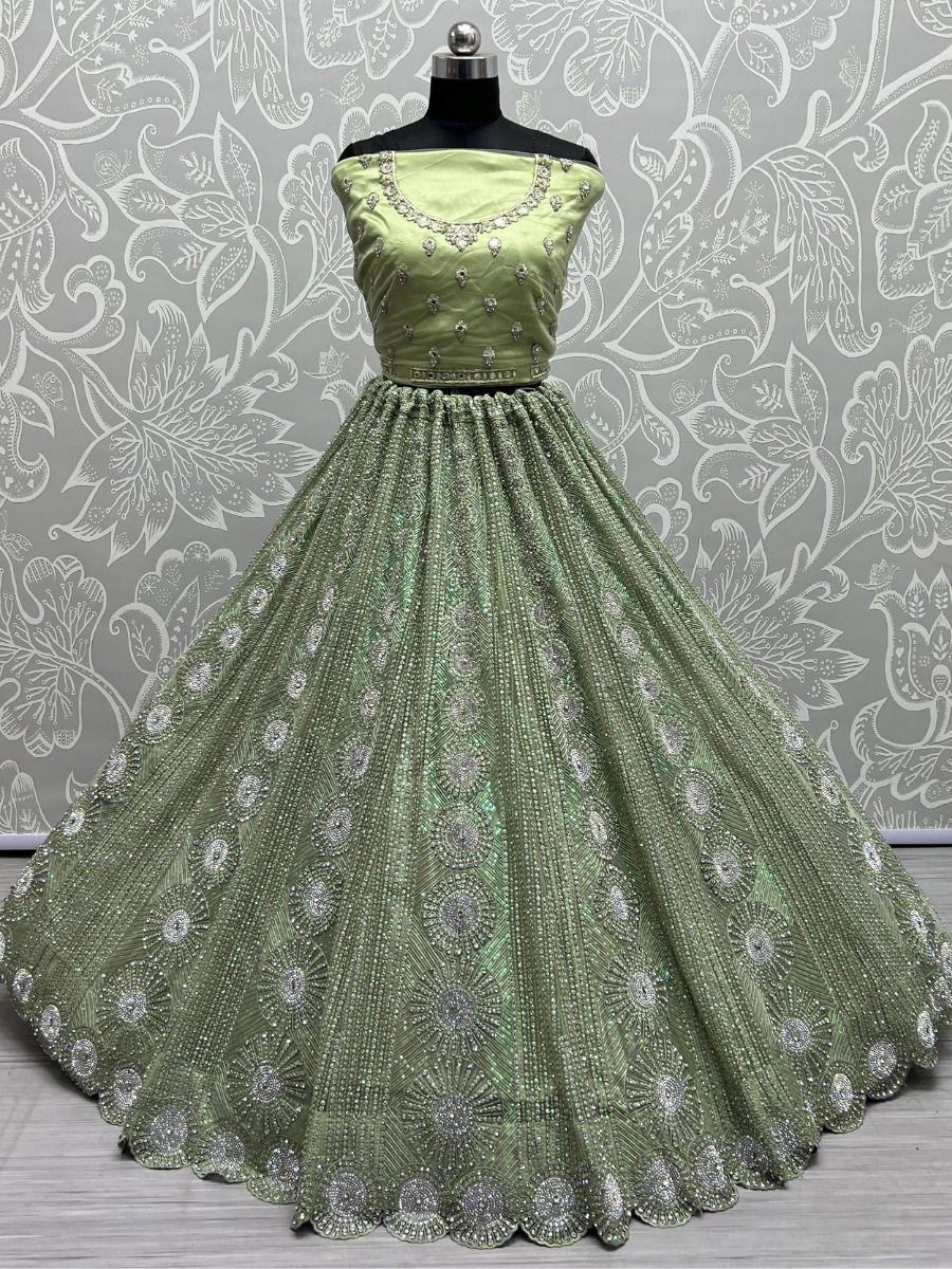 Attractive Pista Green Sequins Net Engagement Wear Lehenga Choli