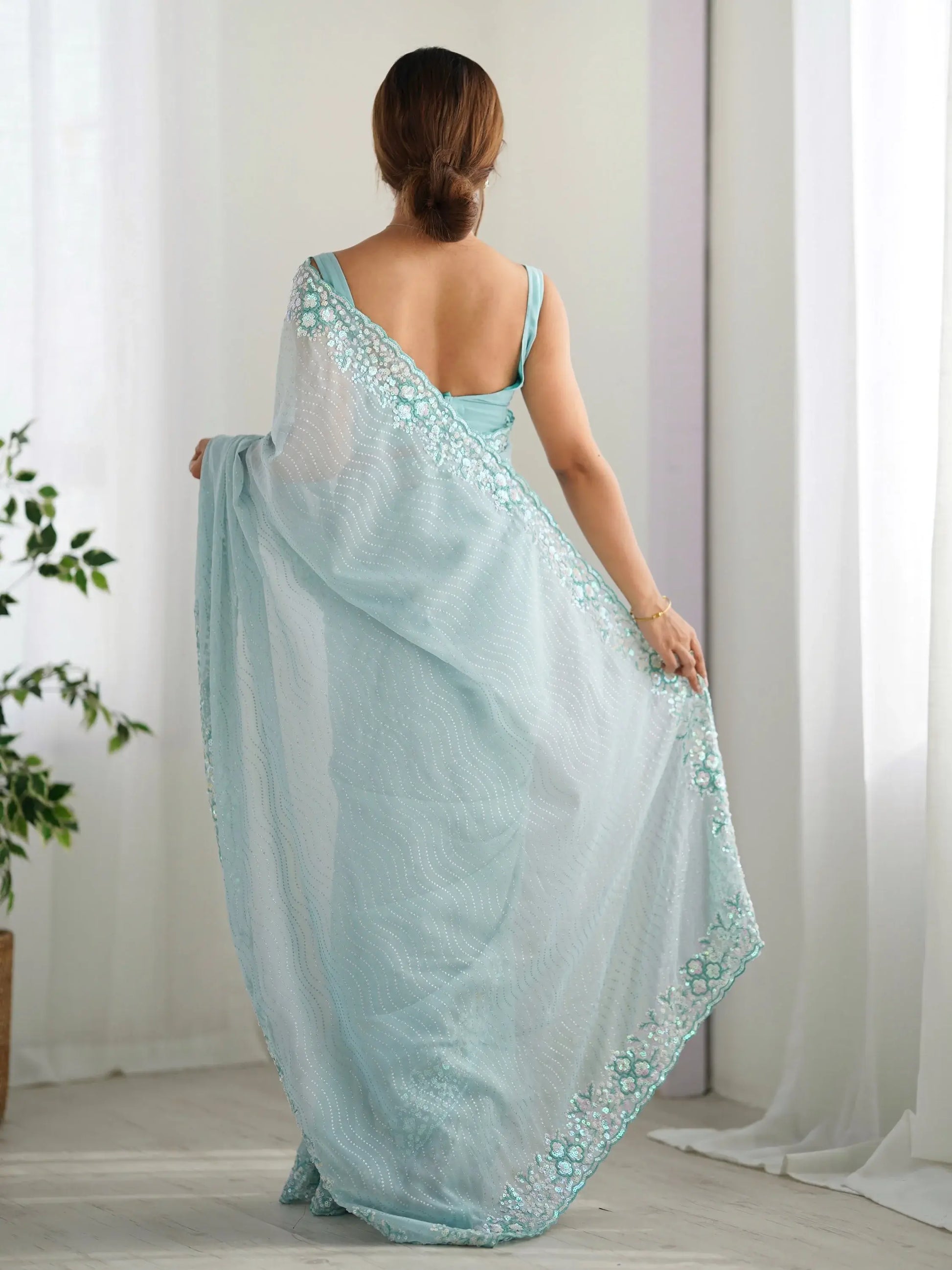 Attractive Sky Blue Sequins Georgette Reception Wear Saree With Blouse - Zeel Clothing