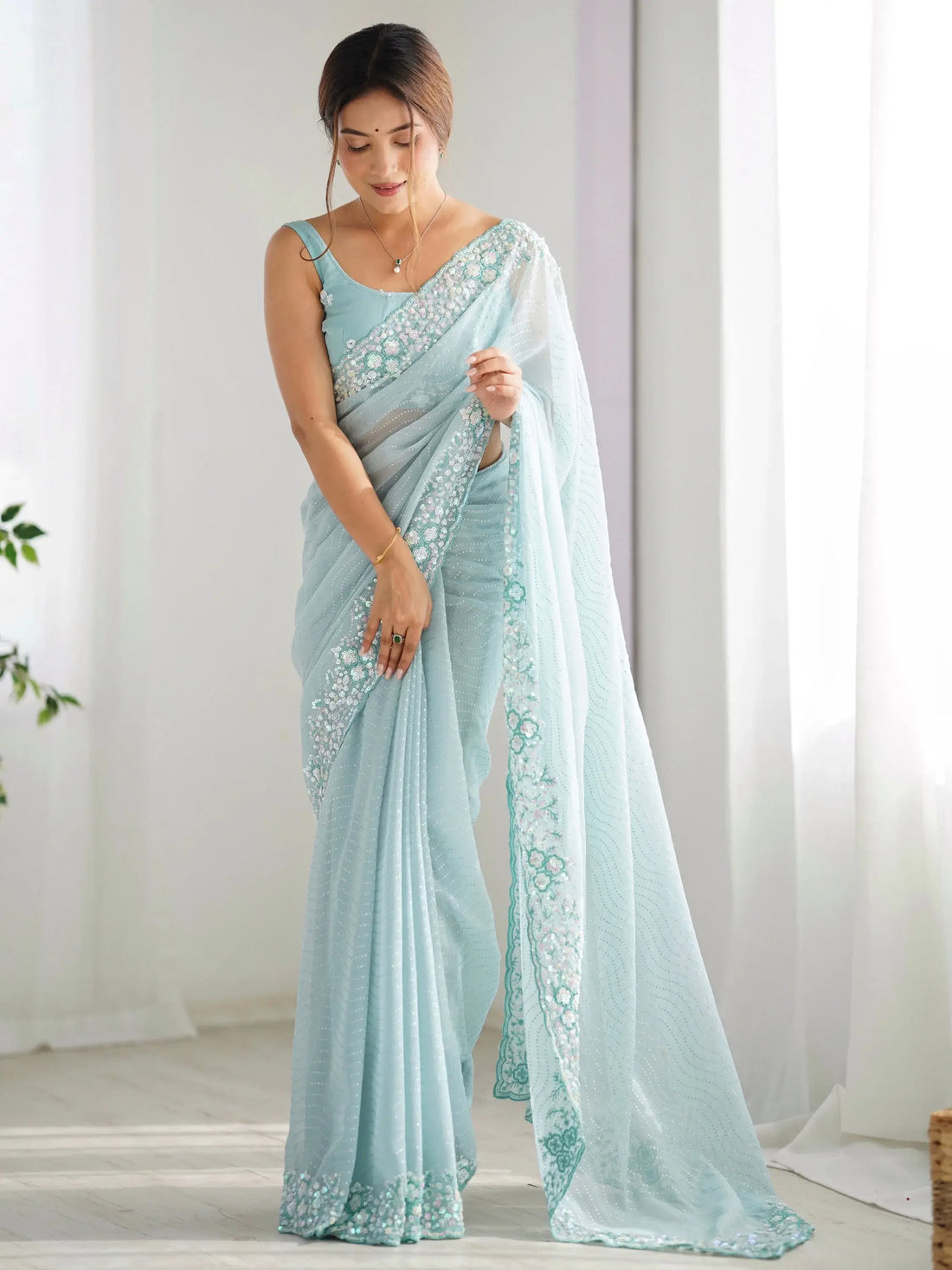 Attractive Sky Blue Sequins Georgette Reception Wear Saree With Blouse - Zeel Clothing