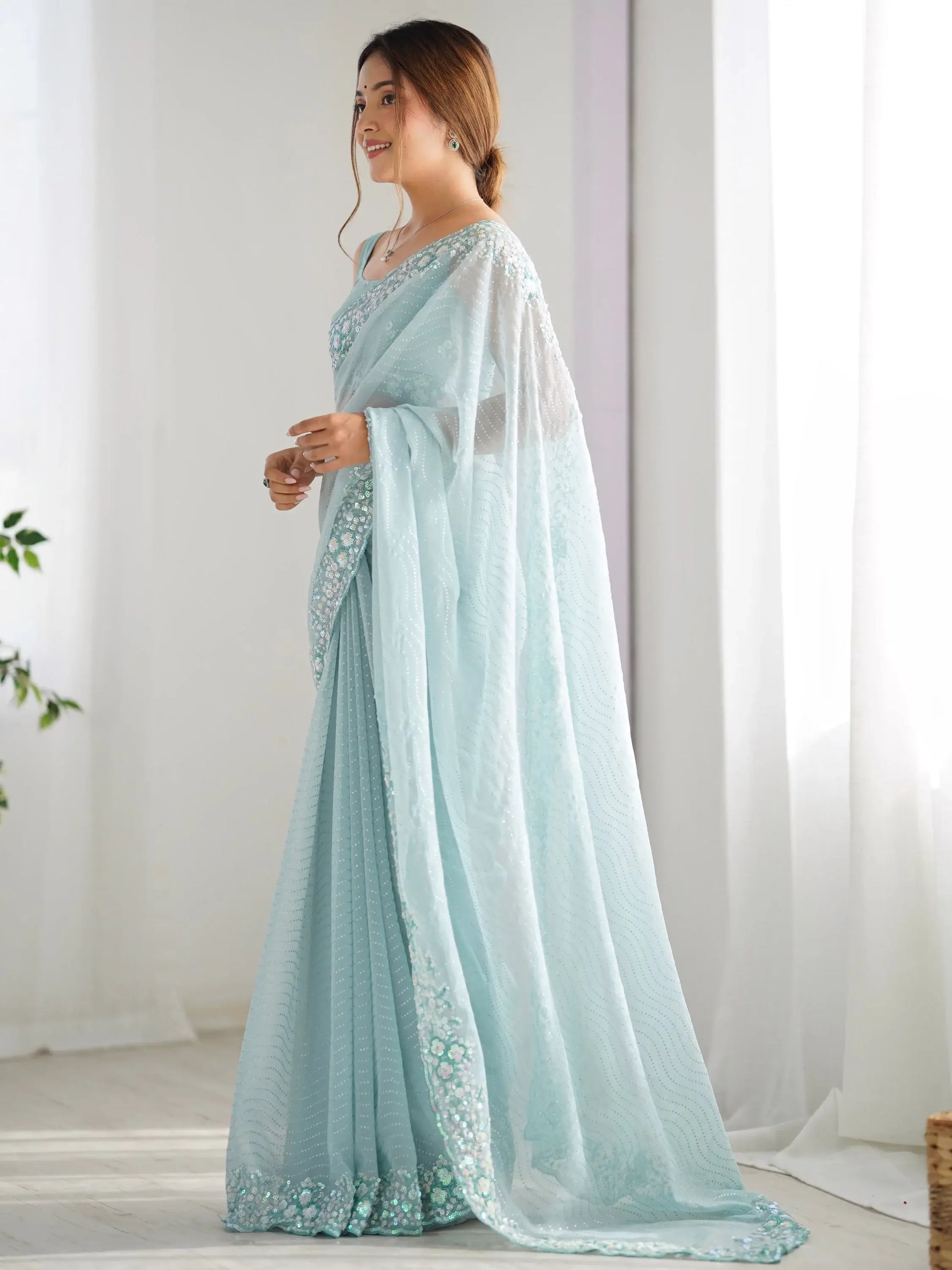 Attractive Sky Blue Sequins Georgette Reception Wear Saree With Blouse - Zeel Clothing