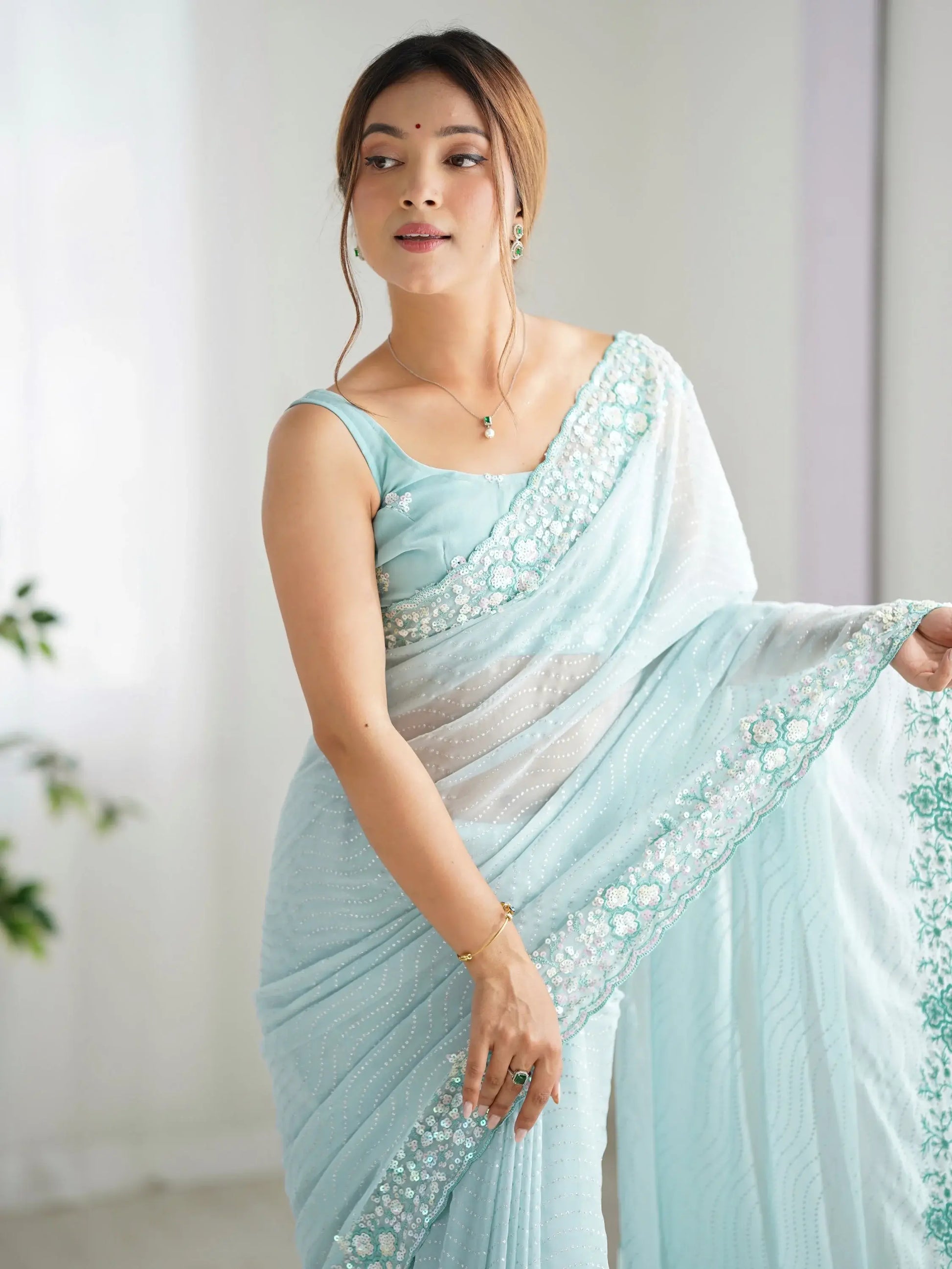 Attractive Sky Blue Sequins Georgette Reception Wear Saree With Blouse - Zeel Clothing