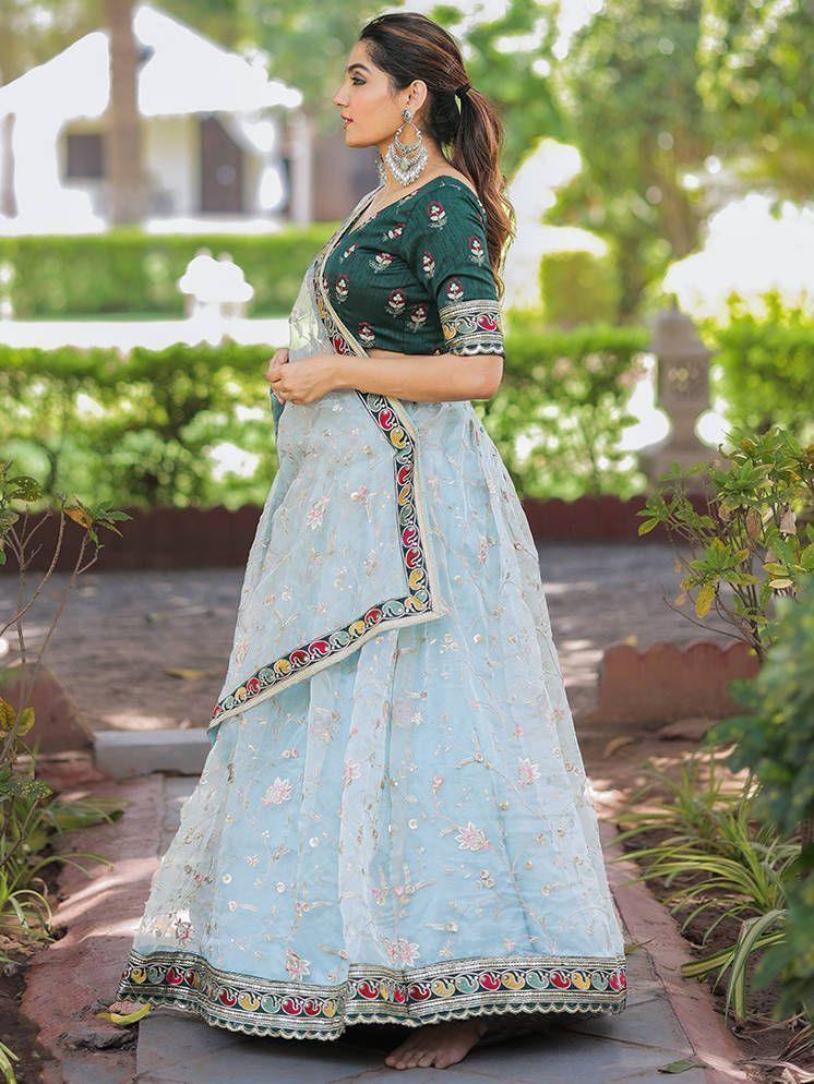 Attractive Sky Blue Thread Embroidery Organza Lehenga With Green Choli
