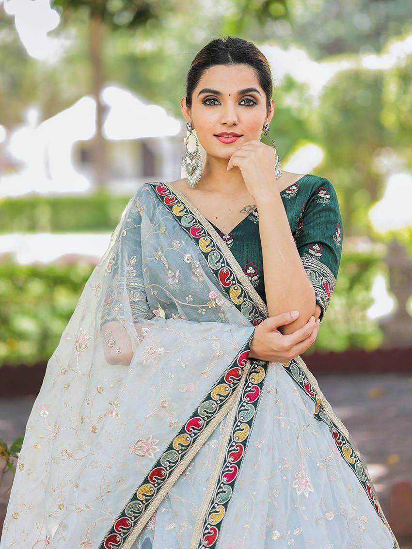 Attractive Sky Blue Thread Embroidery Organza Lehenga With Green Choli - Zeel Clothing