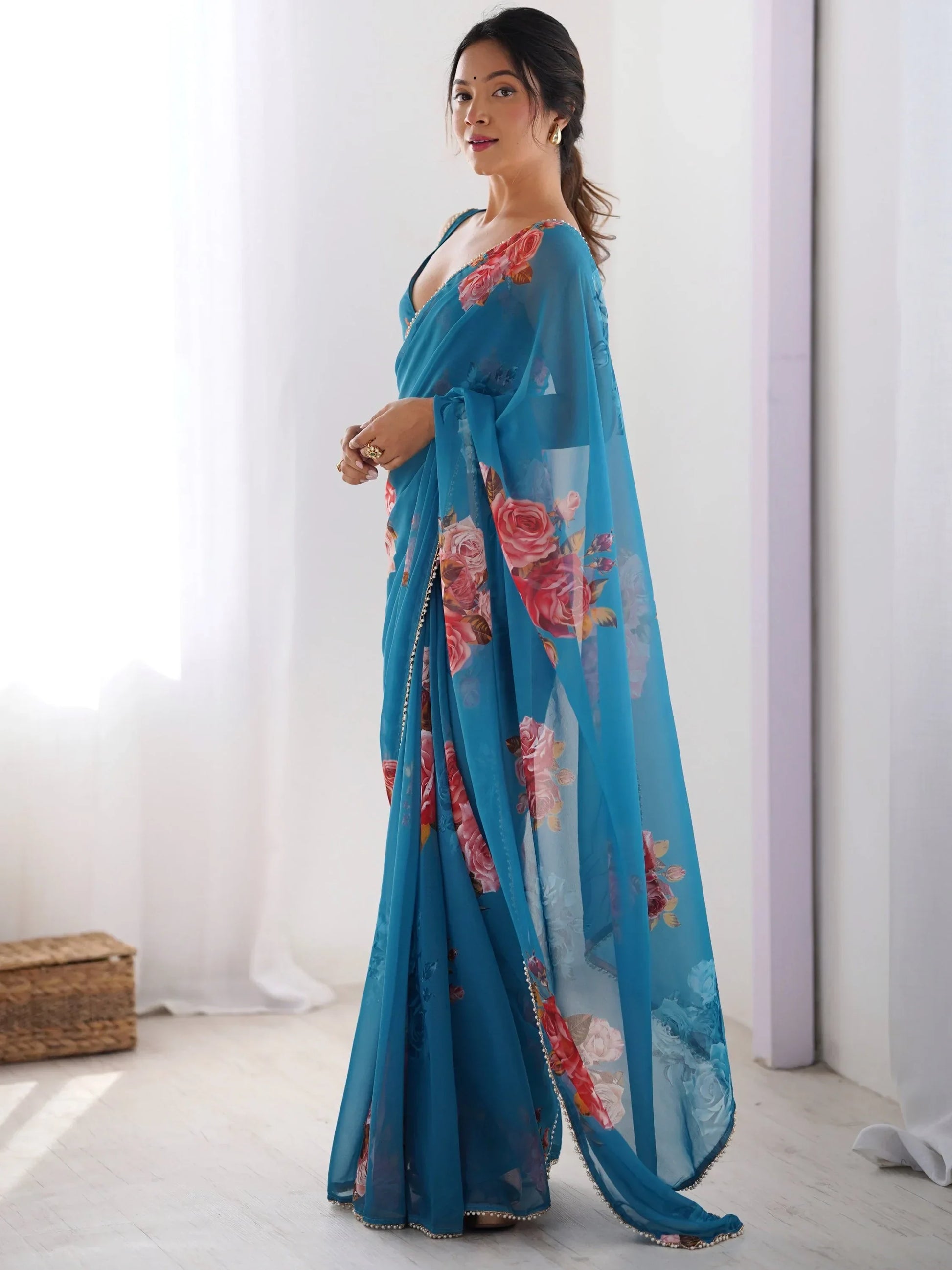 Attractive Teal Blue Floral Printed Georgette Casual Wear Saree - Zeel Clothing