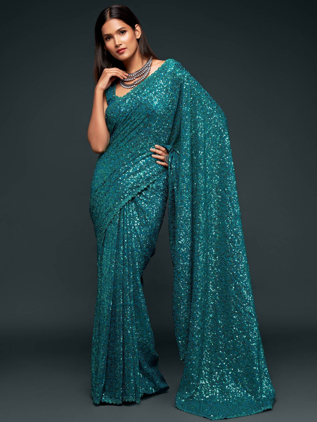Attractive Teal Blue Sequined Georgette Party Wear Saree - Zeel Clothing
