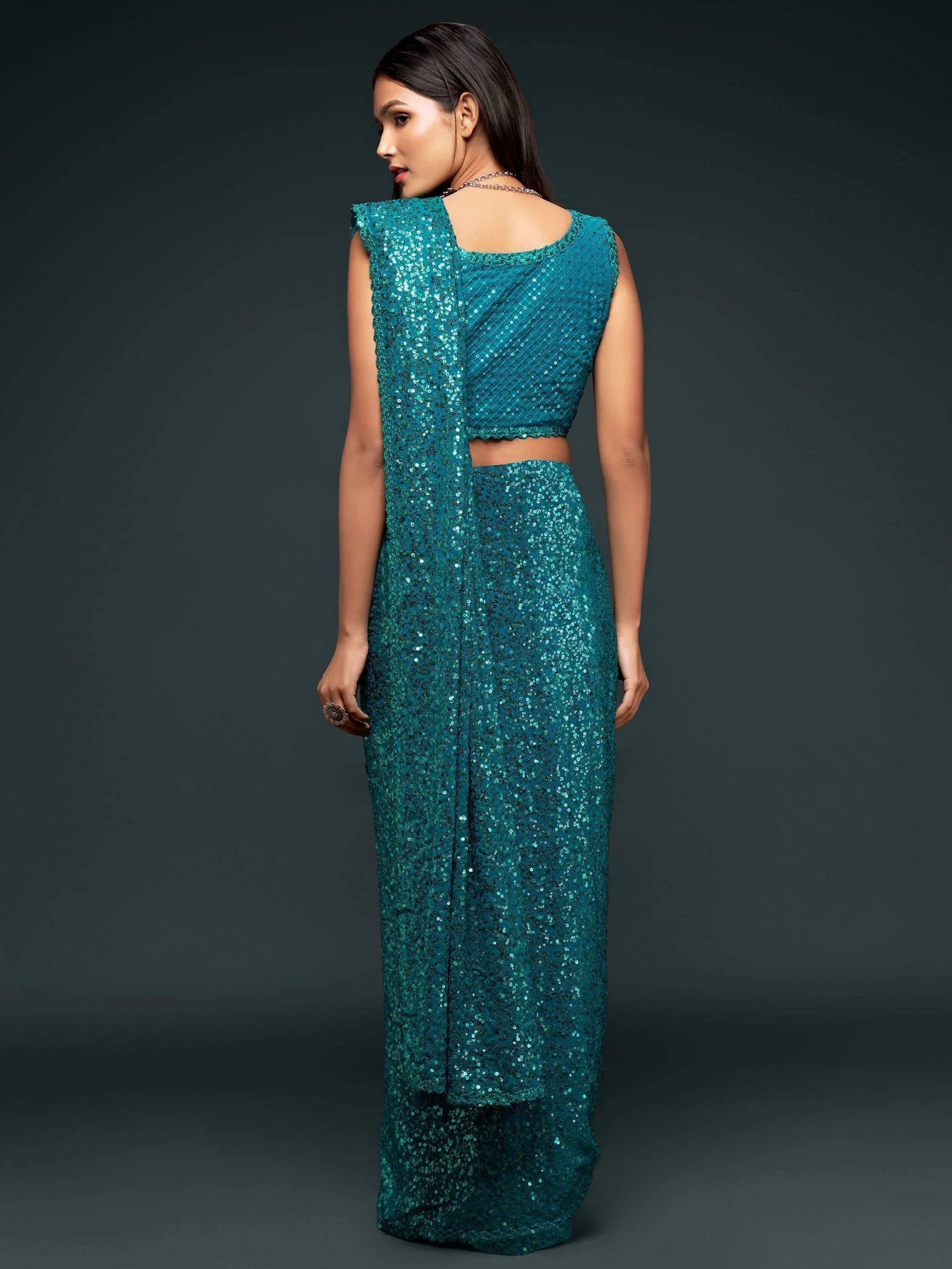 Attractive Teal Blue Sequined Georgette Party Wear Saree - Zeel Clothing